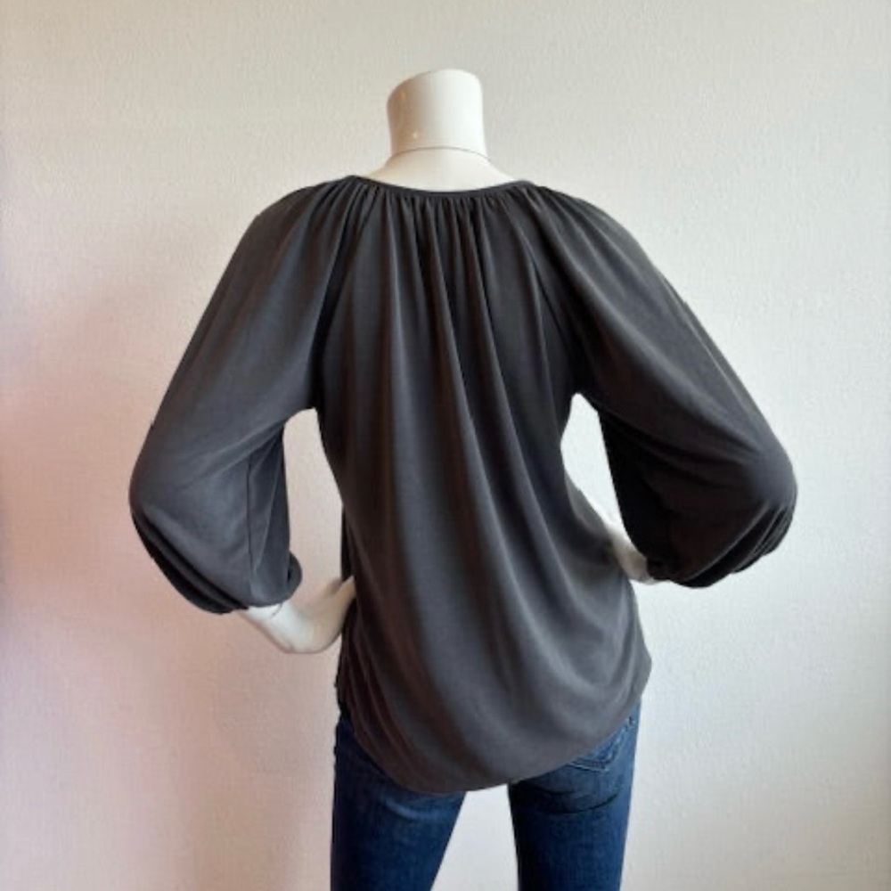 Cato’s women’s size extra large scoop neck lace up chain blouse.‎ Black